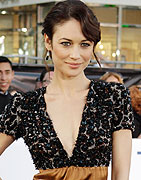 Actress Olga Kurylenko poses at the premiere of her new film 'Oblivion' in Hollywood