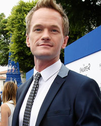 Cast member Neil Patrick Harris poses at the premiere of the film 'The Smurfs 2' at the Regency Village theatre in Los Angeles