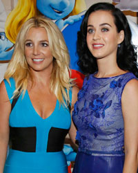 Singers Britney Spears (L) and Katy Perry pose at the premiere of 'The Smurfs 2' at the Regency Village theatre in Los Angeles