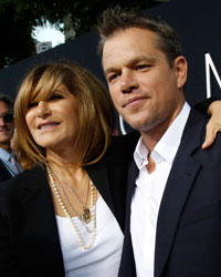 Cast member Matt Damon poses with Amy Pascal, co-chairman of Sony Pictures Entertainment, Inc. and Chairman of SPE's Columbia TriStar Motion Picture Group, at the world premiere of 'Elysium' in Los Angeles, California