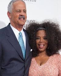 Cast member Oprah Winfrey and her partner Stedman Graham attend director Lee Daniels' 'The Butler' New York film premiere at the Ziegfeld Theater in New York