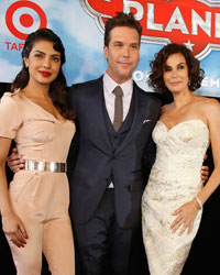 Actor Dane Cook, who voices the character of 'Dusty Crophopper' poses with actresses Teri Hatcher, who voices the character of 'Dottie'' and Priyanka Chopra, who voices the character of 'Ishani'' at the world premiere of 'Planes' at El Capitan theatre in Hollywood, California