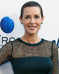 Cast member Embeth Davidtz poses at the premiere of 'Paranoia' in Los Angeles, California