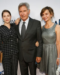 Cast member Harrison Ford poses with his wife Calista Flockhart and his daughter Georgia at the premiere of 'Paranoia' in Los Angeles, California