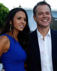 Cast member Matt Damon and his wife Luciana Barroso pose at the world premiere of 'Elysium' in Los Angeles, California