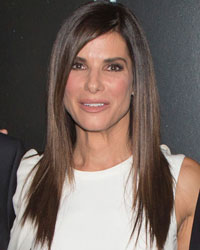 Jonas Cuaron (L-R), George Clooney, Sandra Bullock, Alfonso Cuaron and David Heyman arrive for the film premiere of 'Gravity' in New York