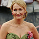 J.K. Rowling poses as she arrives for the world premiere of Harry Potter and the Deathly Hallows: Part 2 in London