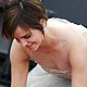 Emma Watson adjusts her gown as she arrives for the world premiere of Harry Potter and the Deathly Hallows - Part 2