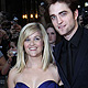 Reese Witherspoon and Robert Pattinson pose for photographers at the premiere of Water for Elephants at the Westfield in London