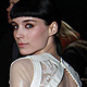 Rooney Mara poses at the world premiere of 'The Girl with the Dragon Tattoo' at the Odeon in London