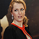 Gillian Anderson poses on the red carpet during the UK premiere of the movie 'Mission: Impossible - Ghost Protocol' in London