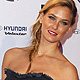 Israeli model Bar Refaeli poses after the show at the MTV Europe Music Awards show in Belfast