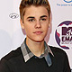 Canadian pop star Justin Bieber poses on arrival on the red carpet at the MTV Europe Music Awards show in Belfast