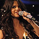 Actress and singer and host of the show Selena Gomez addresses the audience at the MTV Europe Music Awards show in Belfast