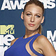 Blake Lively poses for photographers at the 2011 MTV Movie Awards