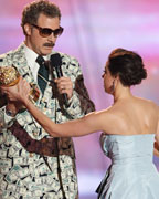 Actor Will Ferrell accepts the comedic genius award with actress Aubrey Plaza at the 2013 MTV Movie Awards in Culver City, California