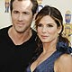 Actors Ryan Reynolds and Sandra Bullock pose at the 2009 MTV Movie Awards in Los Angeles