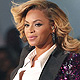 Beyonce Knowles shows her baby bump after performing at the 2011 MTV Video Music Awards in Los Angeles