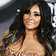 Nicole 'Snooki' Polizzi from the MTV reality series 'Jersey Shore' poses at the 2011 MTV Video Music Awards in Los Angeles