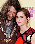 Actress Emma Watson with actor Ezra Miller arrive at the 2012 MTV Video Music Awards in Los Angeles