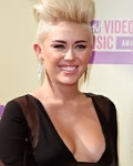 Singer Miley Cyrus arrives for the 2012 MTV Video Music Awards in Los Angeles