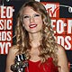 Taylor Swift poses with her best female video award at the 2009 MTV Video Music Awards in New York