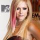 Avril Lavigne poses on the red carpet before the MTV Europe Awards