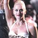 Gwen Stefani waves to the crowd after she is announced as the winner of the $100K Fashion Challenge charity contest at the 2005 MTV Video Music Awards.