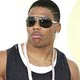 Nelly poses during arrivals for the MTV Video Music Awards in Miami.