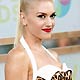 Singer Gwen Stefani poses for photographers during arrivals for the MTV Video Music Awards.