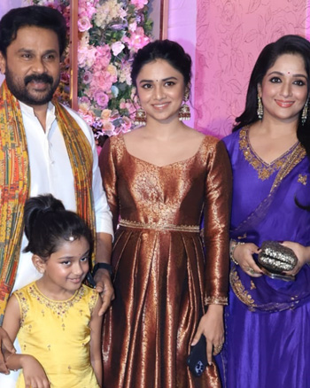 Dileep with his wife Kavya and children