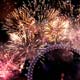 Fireworks explode over the London Eye in central London