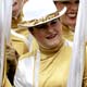 Girls from marching band prepare to participate in 20th London new years day parade outside in central London