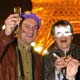 Revellers celebrate the New Year at the foot of the Eiffel tower in Paris