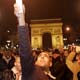 Revellers celebrate the New Year on the Champs Elysee in Paris