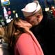 Joshua Galaway kisses Megan Johnson after midnight at Times Square on New Year's day in New York