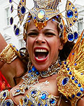 Performers dance at the Notting Hill Carnival in west London