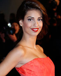 French-Israeli singer Tal arrives at the Cannes festival palace to attend the NRJ Music Awards in Cannes