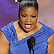 Mo`Nique accepts the award for best supporting actress for `Precious: Based on the novel `Push` by Sapphire` during the 82nd Academy Awards