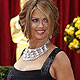 Kathy Ireland, host of the red carpet television broadcast, poses for photographers on the red carpet at the 82nd Academy Awards