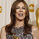 Director Kathryn Bigelow (L) poses with her Oscar for best director for `The Hurt Locker` at the the 82nd Academy Awards in Hollywood