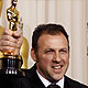 Mauro Fiore holds up his best cinematography Oscar for `Avatar` at the the 82nd Academy Awards in Hollywood