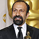 Asghar Farhadi, director of Iranian film 'A Separation', poses with his award for Best Foreign Language film during the 84th Academy Awards