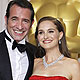 Jean Dujardin, best actor for his role in 'The Artist' poses with presenter Natalie Portman during the 84th Academy Awards in Hollywood