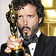 New Zealand's Bret McKenzie holds his Oscar after winning Music (Original Song) award for film 'The Muppets' during 84th Academy Awards