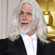 Robert Richardson poses with his Best Cinematography award for the film 'Hugo' during the 84th Academy Awards in Hollywood