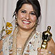 Directors Obaid-Chinoy and Daniel Junge, winners of the Best Documentary Short Subject', pose at 84th Academy Awards in Hollywood