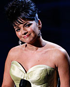 Norah Jones performs the song 'Everybody Needs A Best Friend' from the film 'Ted' at the 85th Academy Awards in Hollywood, California