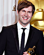 Shawn Christensen holds his Oscar for best live action short feature for his film 'Curfew' at the 85th Academy Awards in Hollywood, California