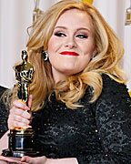 Adele Adkins and Paul Epworth pose with their Oscar for Achievement in Music Written For Motion Pictures for 'Skyfall' at the 85th Academy Awards in Hollywood, California